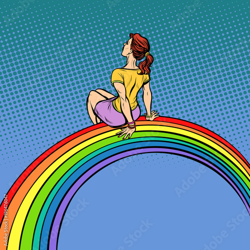 The girl visionary young woman sitting on a rainbow