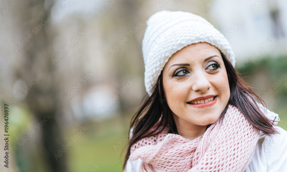 Portrait of smiling pretty woman wearing warm clothes Portrait of smiling pretty woman wearing warm clothes