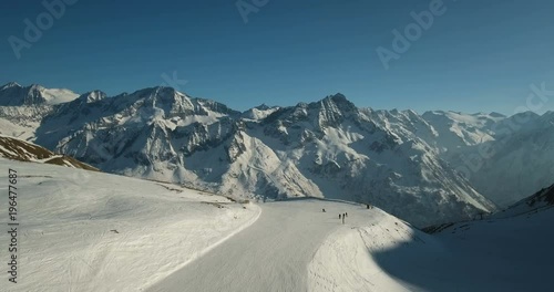 Skiers on a Slope in the Paso del Tonale photo