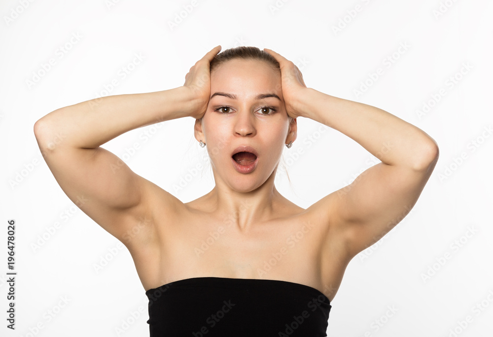 woman doing face fitness, aging chang in the muscles of the face. beauty and health concept woman doing face fitness, aging chang in the muscles of the face. beauty and health concept