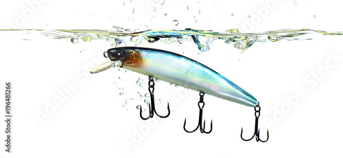 Hard lure under the water with splashes and bubbles.