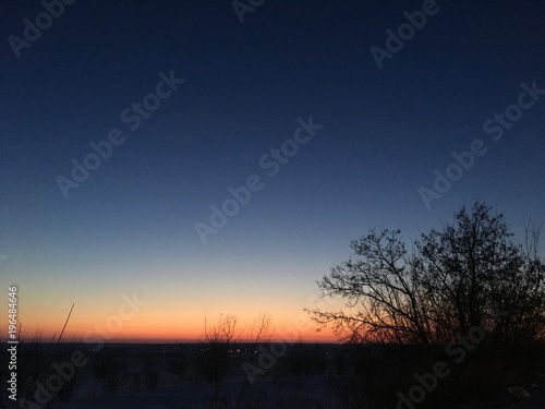 sunset sky in a field with different colors