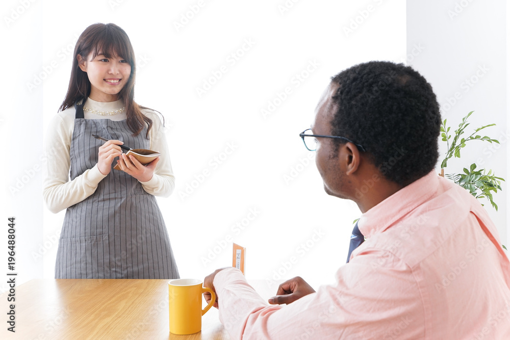 Waiter foreign customer image Waiter foreign customer image
