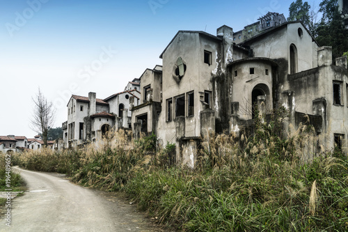 The dilapidated villas are in the outskirts