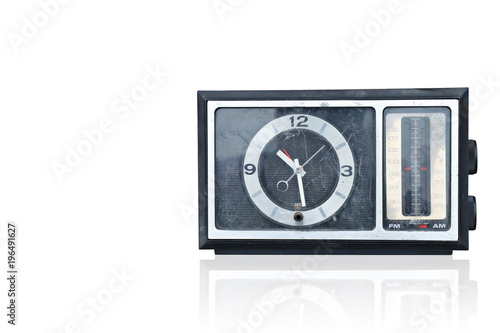 di cut old clock and radio on white background,object,copy space photo