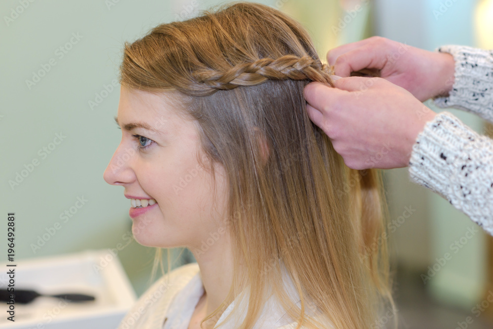 Fototapeta premium woman having her hair groomed