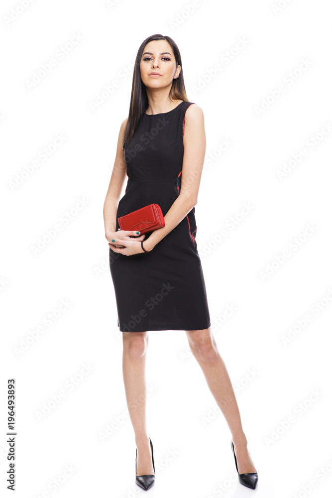 Full length portrait of stylish young woman posing isolated on a white background Full length portrait of stylish young woman posing isolated on a white background