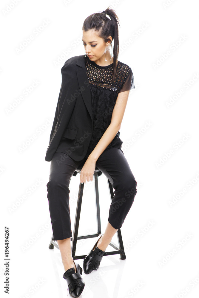 Full length portrait of beautiful female model in casual clothes collection on white background Full length portrait of beautiful female model in casual clothes collection on white background