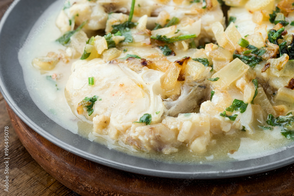 Homemade stew of hake wheels cooked in sauce Homemade stew of hake wheels cooked in sauce
