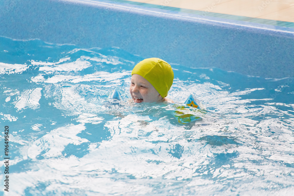 GRODNO, Belarus - Health resort Porechye. Children bathe in a shallow pool.