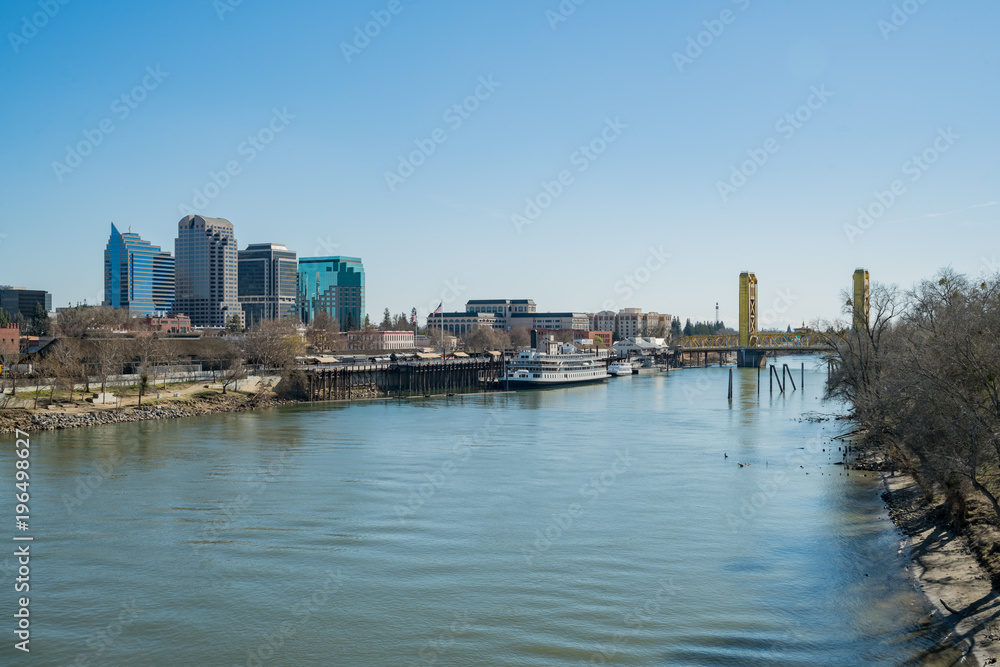 Afternoon view of Sacramento skyline with Sacramento River