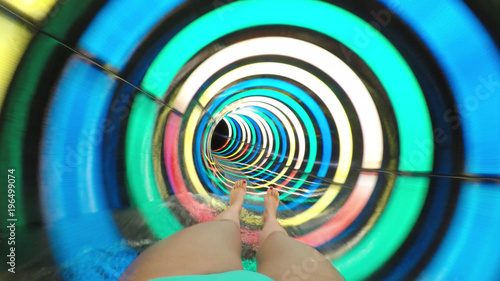 Fotografija Personal Perspective of a Girl Speeding Down at Water Slide