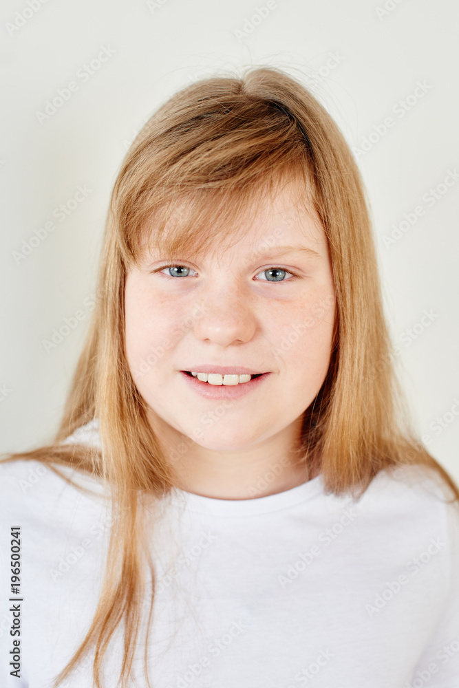 Portrait of redhead teen girl on white background Portrait of redhead teen girl on white background