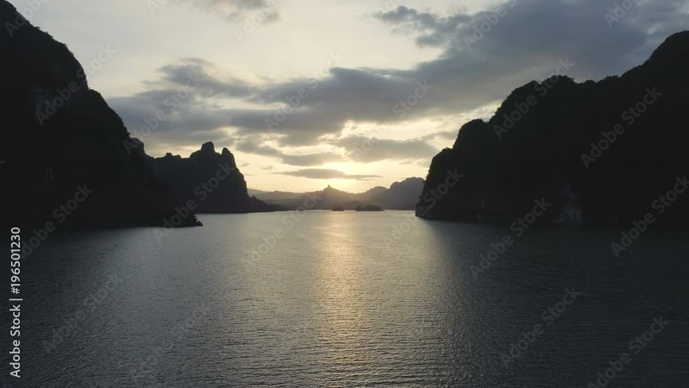 Aerial drone view of beautiful sunset over limestone rocks at the lake in Khao Sok National Park, Surat Thani, Thailand Aerial drone view of beautiful sunset over limestone rocks at the lake in Khao Sok National Park, Surat Thani, Thailand