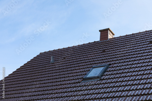 chimney roof house with blue sky