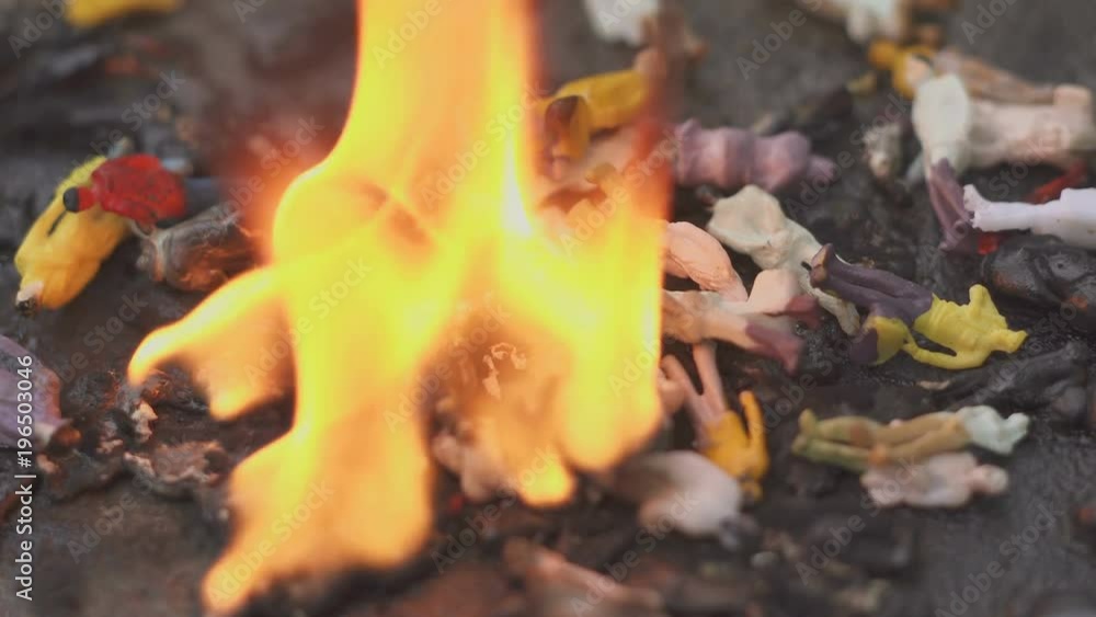 Burning people. Models of people are burning. The concept of aggression, ecology, danger. 4k Burning people. Models of people are burning. The concept of aggression, ecology, danger. 4k