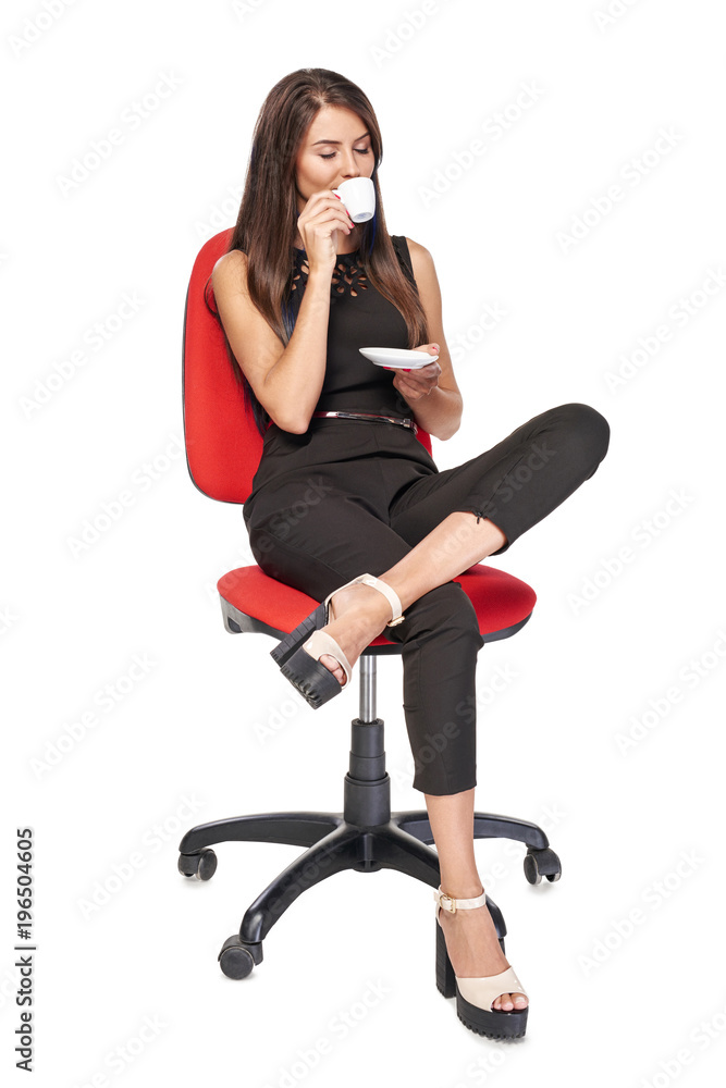 Business woman relaxing drinking coffee sitting in office chair enjoying with closed eyes, isolated on white background Business woman relaxing drinking coffee sitting in office chair enjoying with closed eyes, isolated on white background
