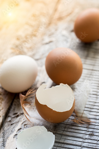 Eggs lay on wooden background. Food ingredient.
