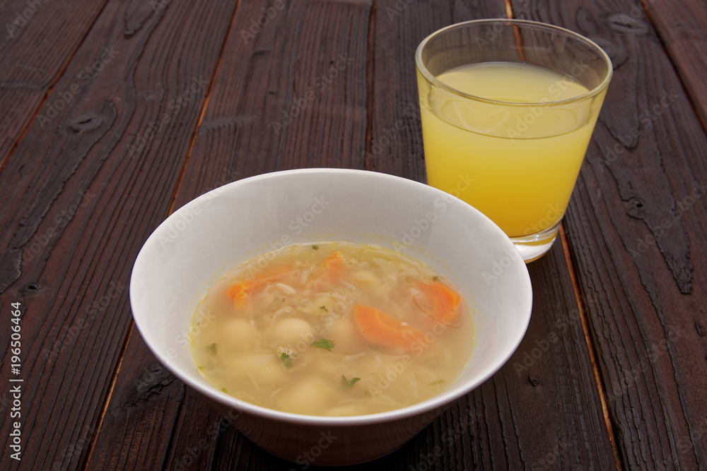 Cabbage soup with vegetables on a table Cabbage soup with vegetables on a table