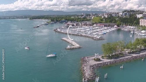 Lausanne Ouchy aerial shot - Flying over the lovely marina - with sail boats. Flying over the lovely marina - with sail boats