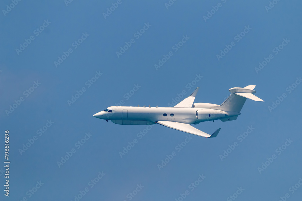 Israeli fighter jet and tanker in air refueling. The Jets flight from right to left in formation. Israeli fighter jet and tanker in air refueling. The Jets flight from right to left in formation.