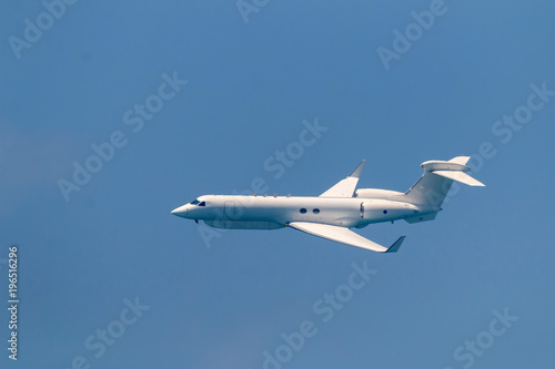 Israeli fighter jet and tanker in air refueling. The Jets flight from right to left in formation.