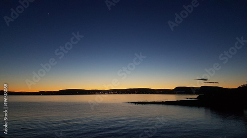 Photography Sunset view on water in Oslofjord and mountains
