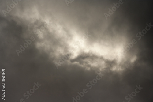 Gray rain clouds. Dark stormy sky background