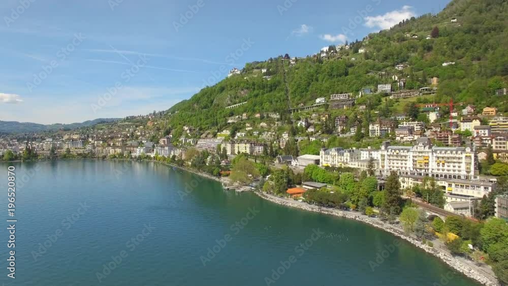 4K Rising aerial shot - Swiss Riviera. Montreux Palace Switzerland - Lake Geneva / Leman 4K Rising aerial shot - Swiss Riviera. Montreux Palace Switzerland - Lake Geneva / Leman