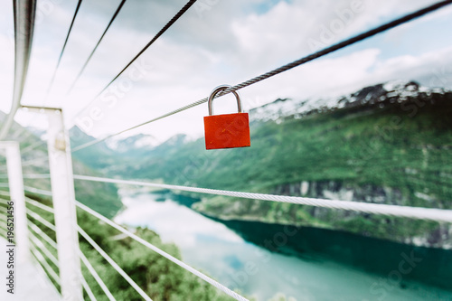 Red padlock and Geirangerfjord from Flydasjuvet viewpoint Norway photo