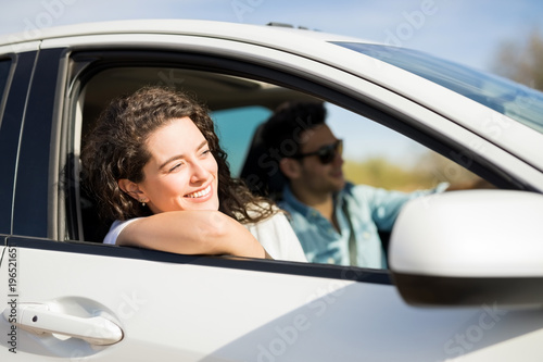 Woman having enjoying on road trip with her boyfriend © AntonioDiaz
