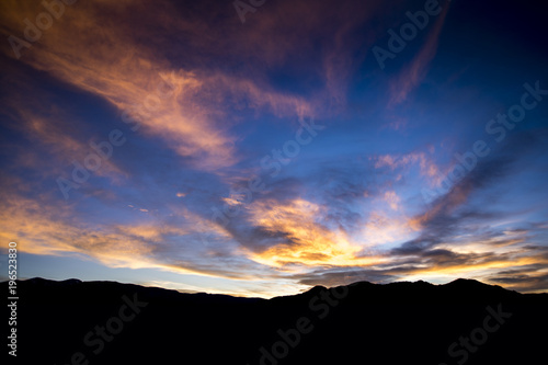 Clouds above Buena Vista, Colorado reflect the colors of the sunrise over the Collegiate Peaks.