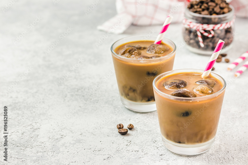 Creamy vanilla mocha iced coffee on concrete background. Selective focus, copy space. Creamy vanilla mocha iced coffee on concrete background. Selective focus, copy space.