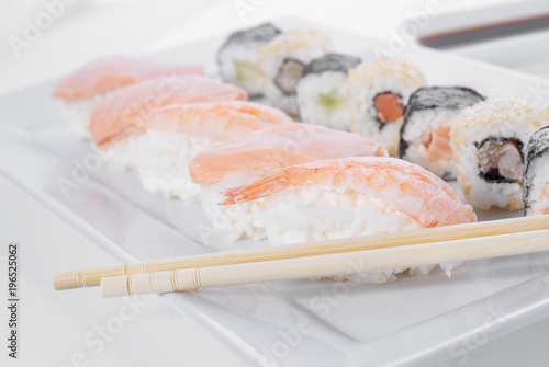 Tasteful frozen sushi with ginger and wasabi