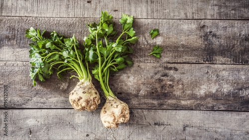 Celery on wooden background photo