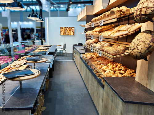Fresh bread and pastries in bakery photo