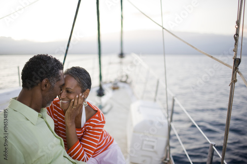 Couple relaxing on a yacht.