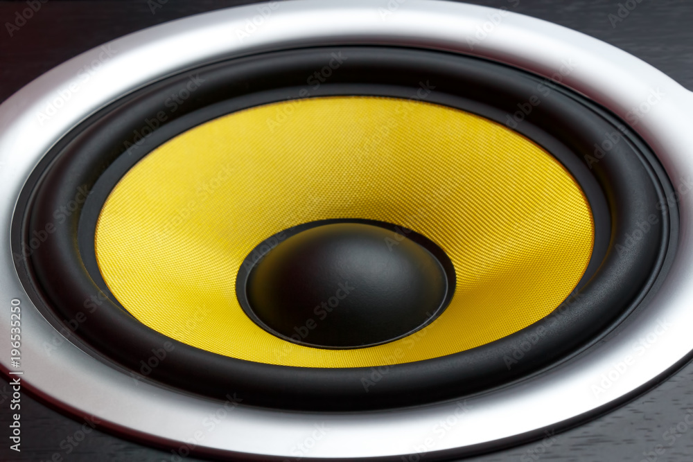 Yellow speaker loudspeaker close-up part of a musical column Yellow speaker loudspeaker close-up part of a musical column