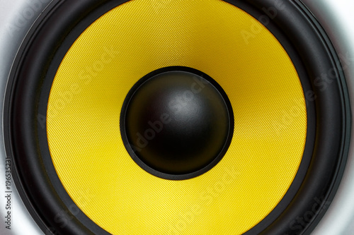 Yellow speaker loudspeaker close-up part of a musical column