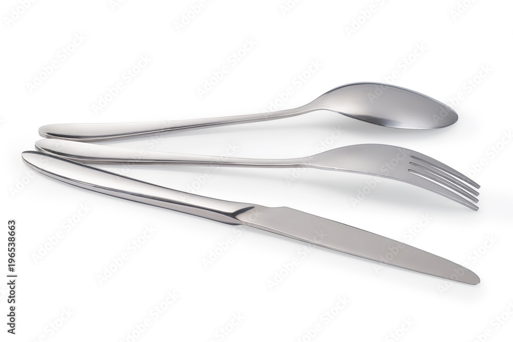 Cutlery laying on white table isolated with clipping path Cutlery laying on white table isolated with clipping path