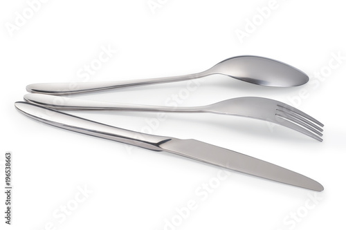Cutlery laying on white table isolated with clipping path