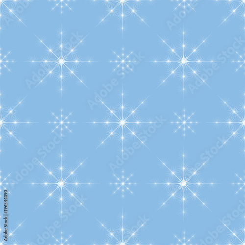 Snowflakes on blue sky - Christmas seamless background photo