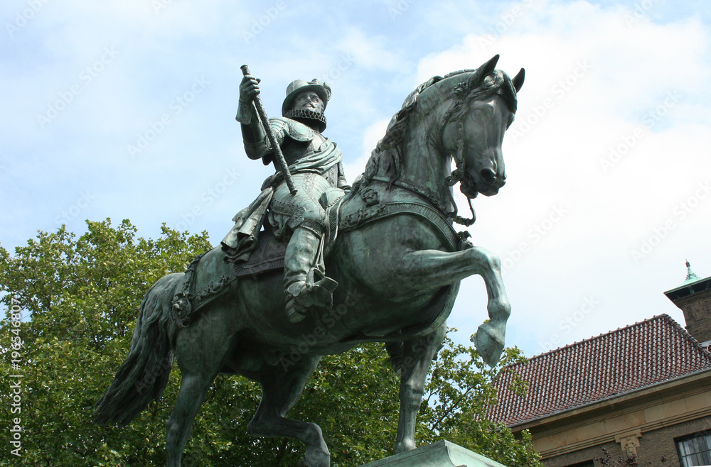 Statue of William of Orange on horseback in front of the royal palace Statue of William of Orange on horseback in front of the royal palace