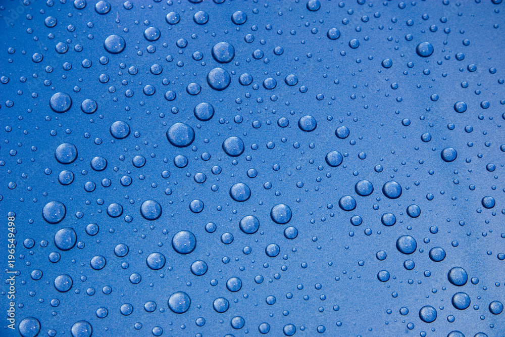 Water Droplets on Blue Metal