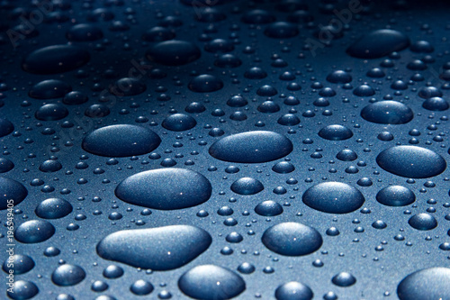 Water Droplets on Blue Metal