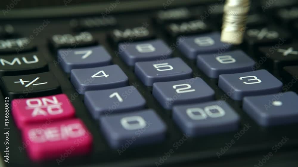 Counting on the calculator with pencil close up 4K. Budget, finances. Counting on the calculator with pencil close up 4K. Budget, finances.