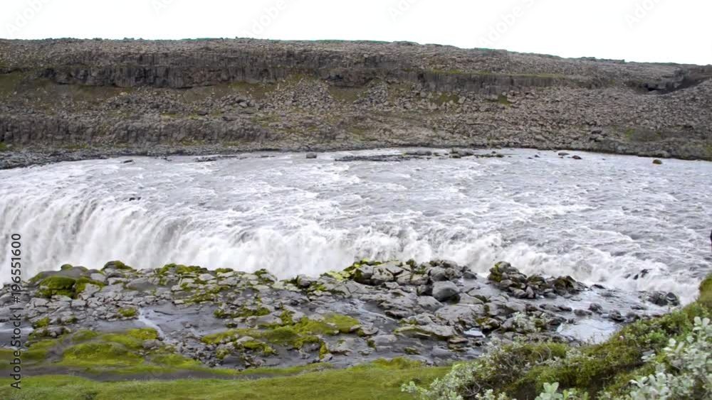 Wonderful and huge waterfall called Dettifoss on Iceland, summer time Wonderful and huge waterfall called Dettifoss on Iceland, summer time