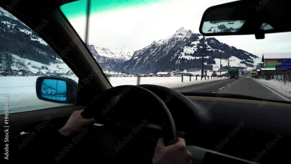 Point of view driving a car on a highway in Switzerland Point of view driving a car on a highway in Switzerland