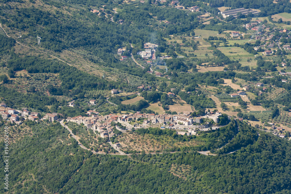 Aerial image of typical village on a hill in the Apennines mountains