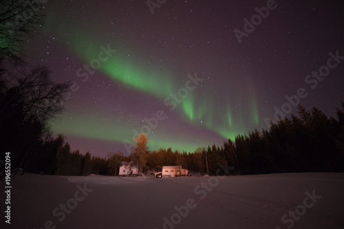Magic Night.Spectacular show of the Northern Lights Aurora Eveness photo